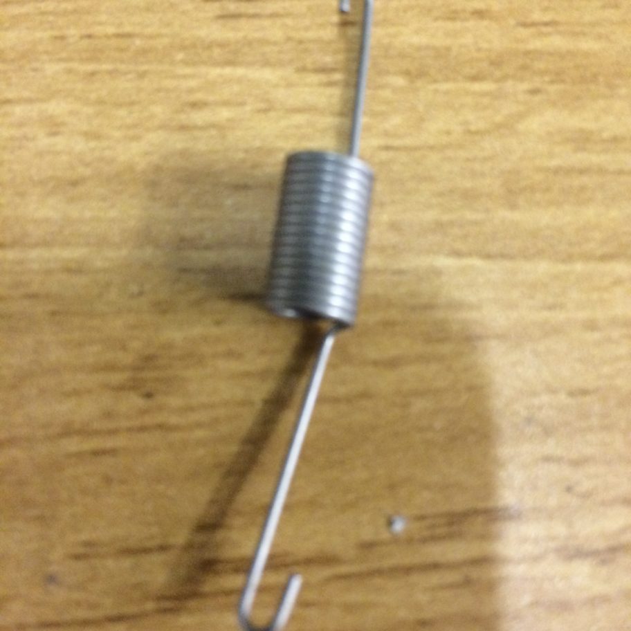 RETURN SPRING